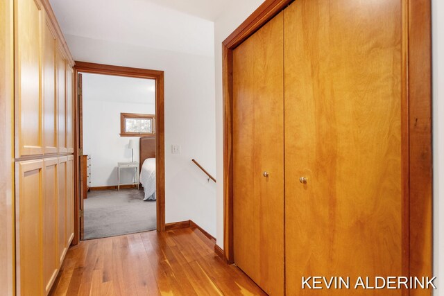 hallway featuring light hardwood / wood-style floors