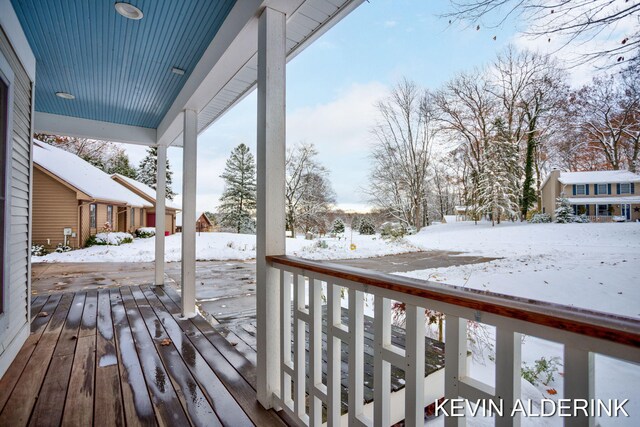 view of snow covered deck