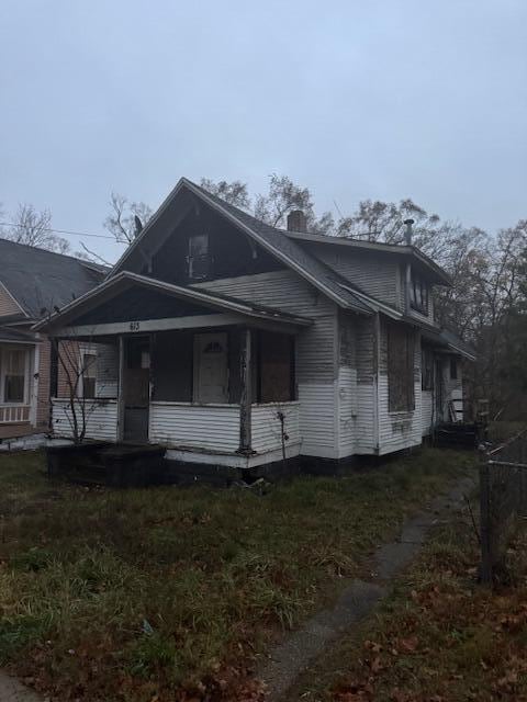 view of home's exterior with a porch