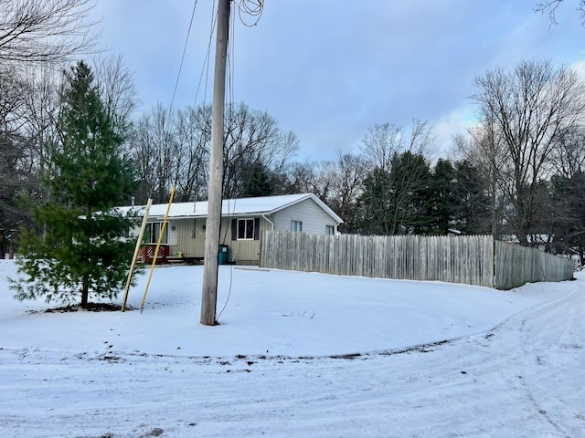 view of yard covered in snow