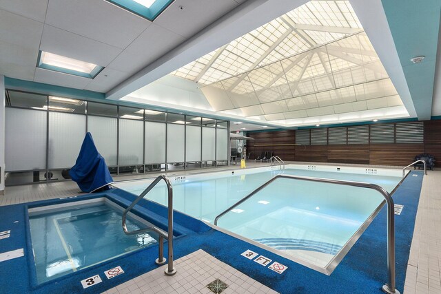 view of pool with a skylight