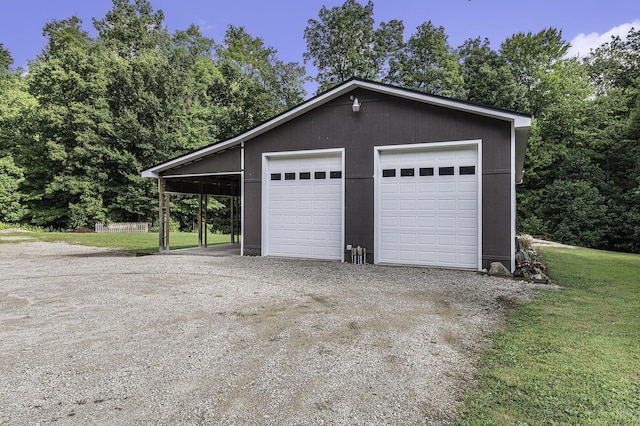 garage with a lawn