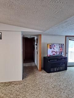 living room with a textured ceiling