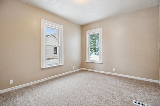 view of carpeted spare room