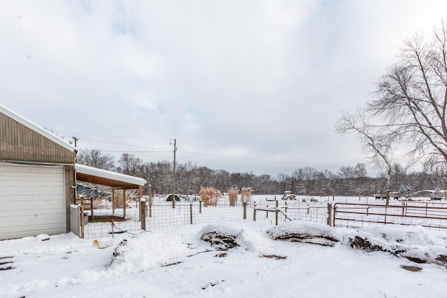 view of yard covered in snow