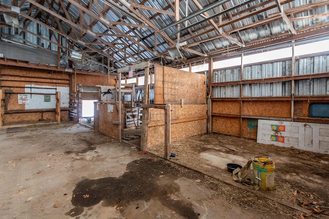 interior space featuring plenty of natural light and concrete flooring