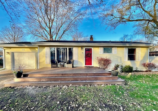 single story home with a garage