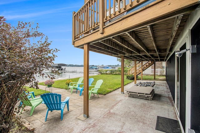 view of patio / terrace with a water view