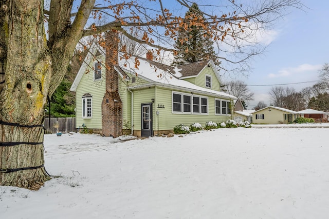 view of snow covered property