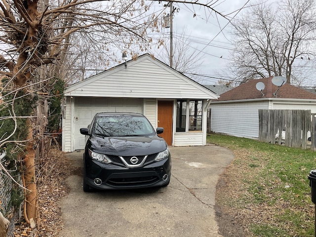 exterior space featuring a garage and an outdoor structure