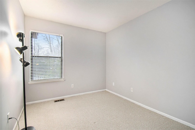 view of carpeted spare room