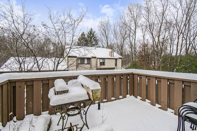 view of snow covered deck