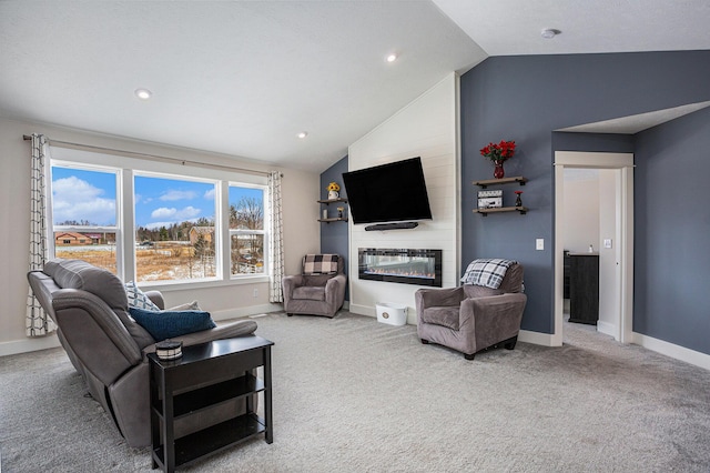 living room with light colored carpet, lofted ceiling, and a fireplace