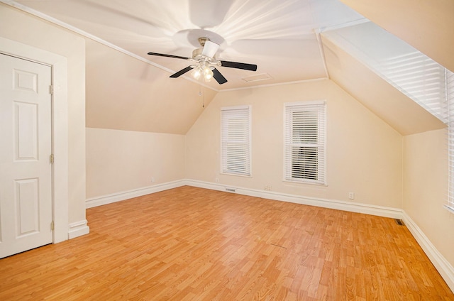 bonus room featuring lofted ceiling, ceiling fan, and light wood-type flooring