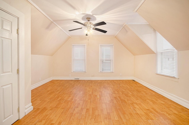 bonus room featuring ceiling fan, vaulted ceiling, and light hardwood / wood-style flooring