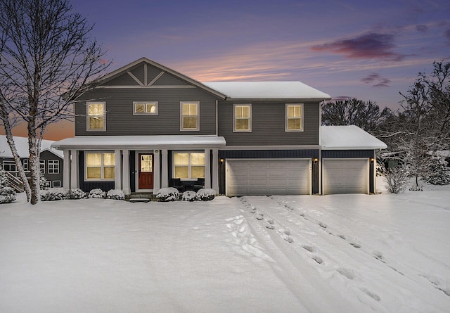 view of front of property featuring a garage