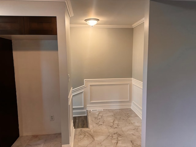 interior space with crown molding