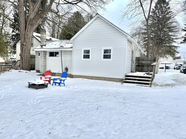 view of snow covered property