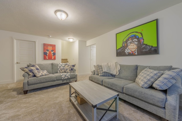 carpeted living room with a textured ceiling