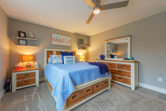 bedroom featuring light carpet and ceiling fan