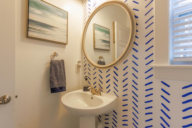 bathroom with plenty of natural light and sink