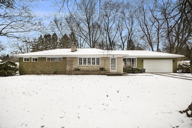 view of front of property with a garage