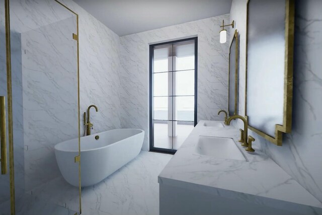 bathroom with a washtub, vanity, and tile walls