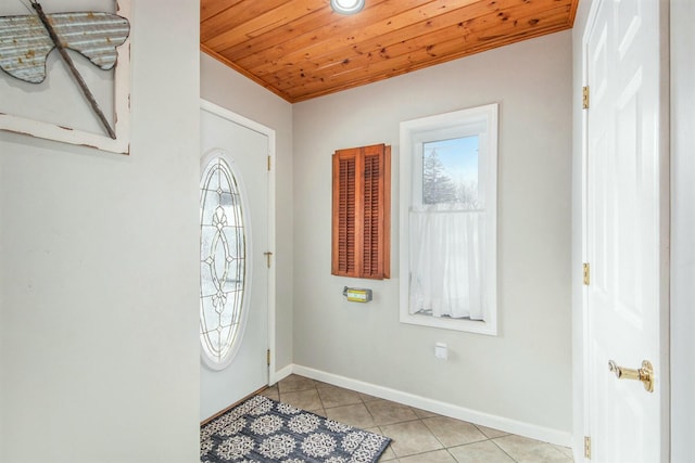 tiled entrance foyer with wooden ceiling