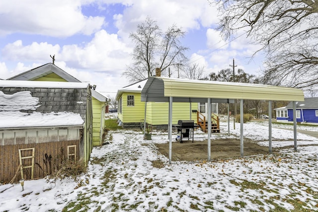 exterior space featuring a carport