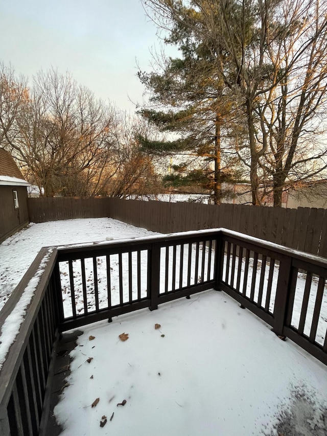 view of snow covered deck