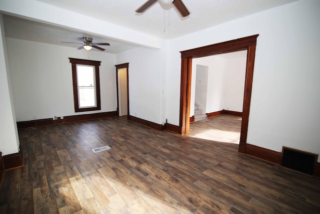 unfurnished room with dark hardwood / wood-style floors and ceiling fan