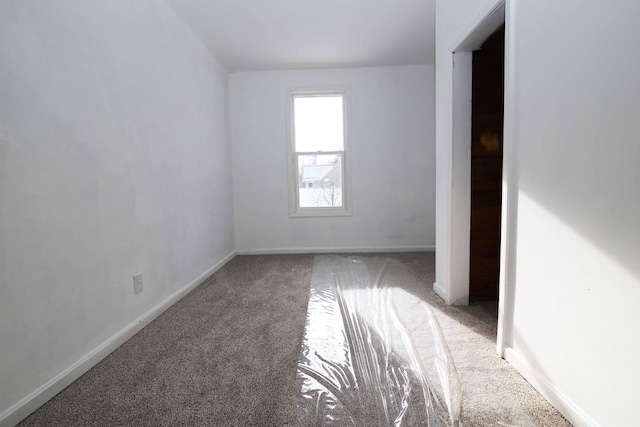 empty room with carpet floors