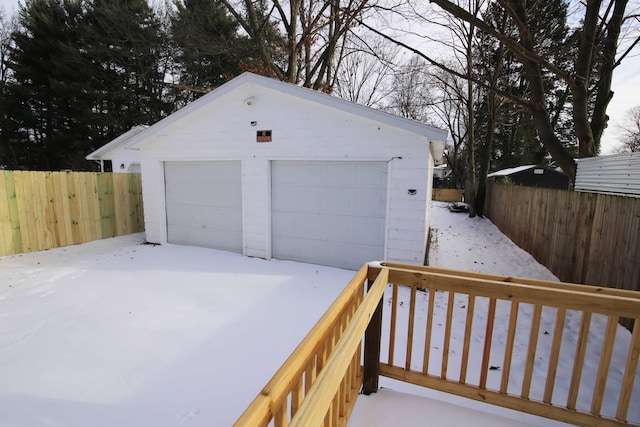 view of snow covered garage