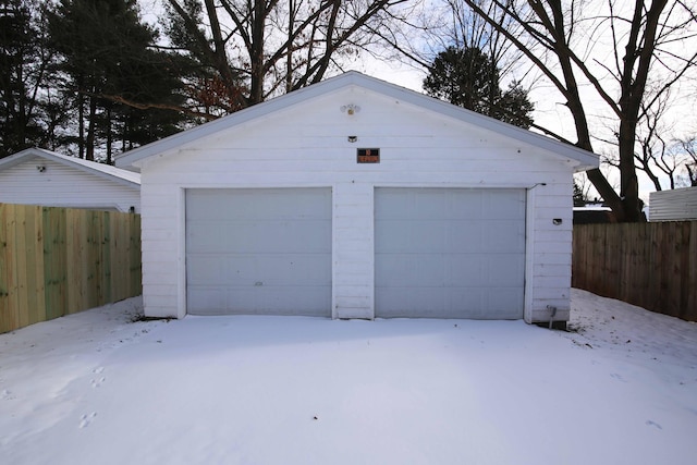 view of snow covered garage