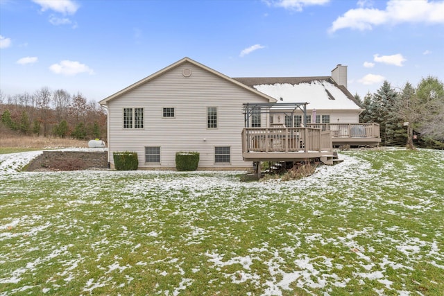 snow covered property featuring a deck