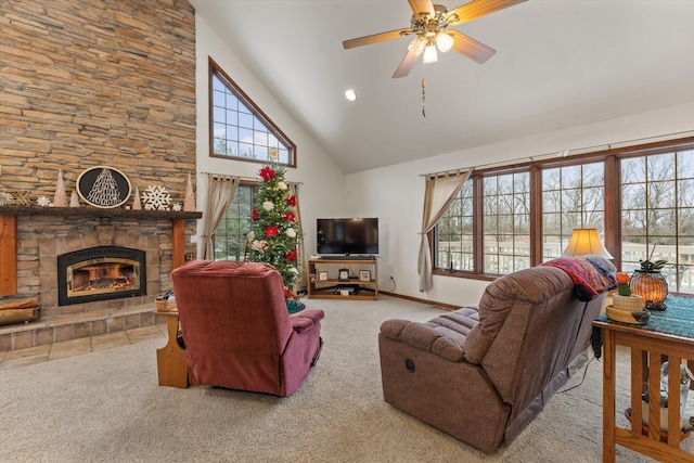 living room with light colored carpet, high vaulted ceiling, and a wealth of natural light