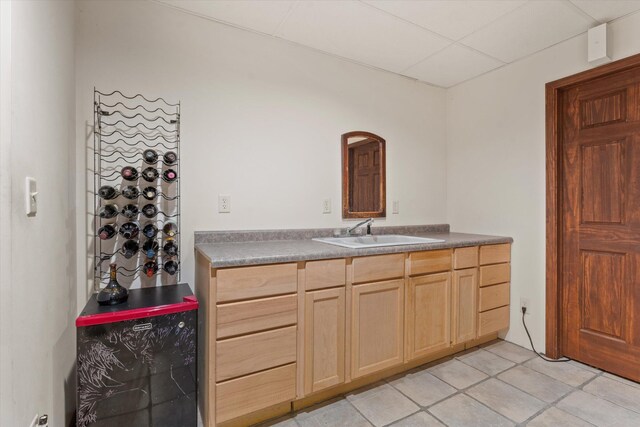 bathroom with tile patterned floors and vanity