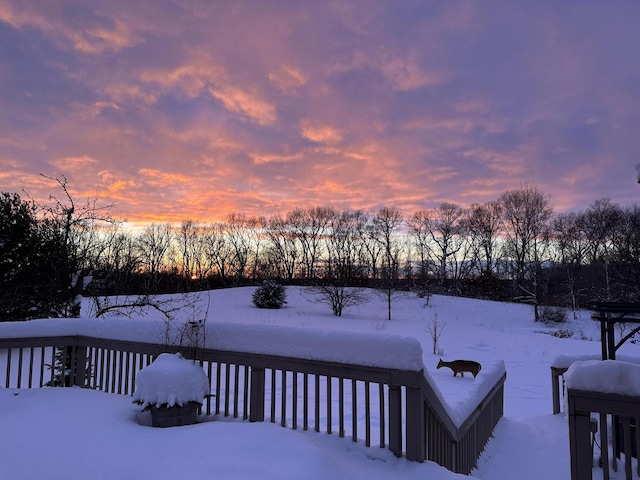 view of snow covered deck