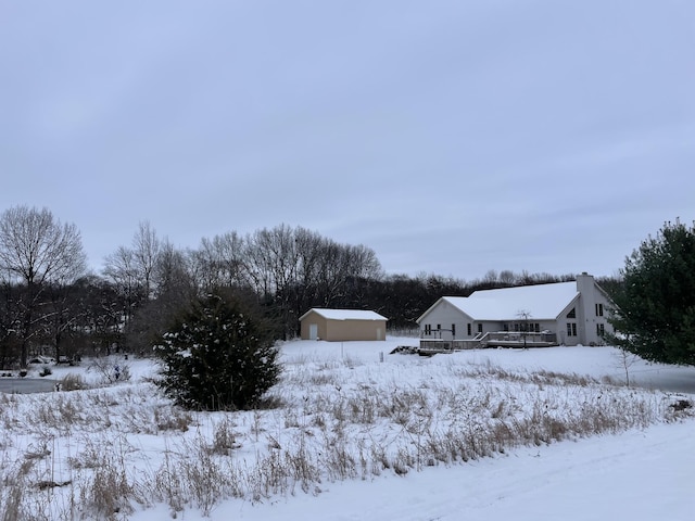 view of yard covered in snow