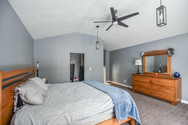 bedroom with carpet, ceiling fan, and lofted ceiling