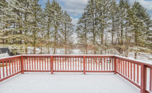 view of snow covered deck