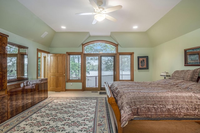 bedroom featuring ceiling fan, access to exterior, light colored carpet, and vaulted ceiling