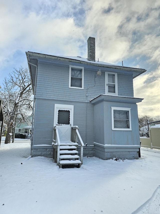 view of snow covered property