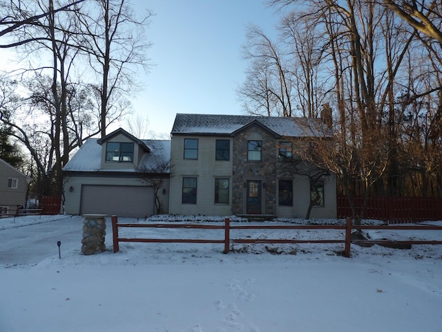 colonial house featuring a garage