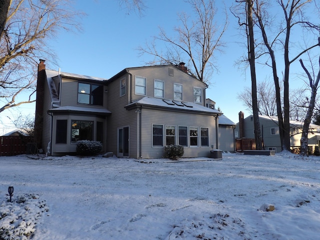 view of snow covered property