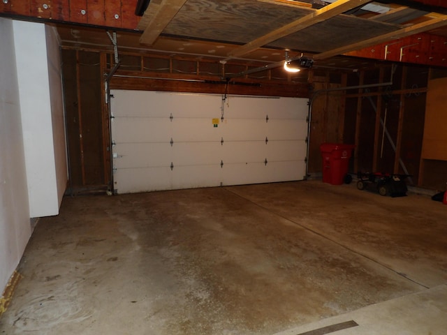 garage featuring a garage door opener