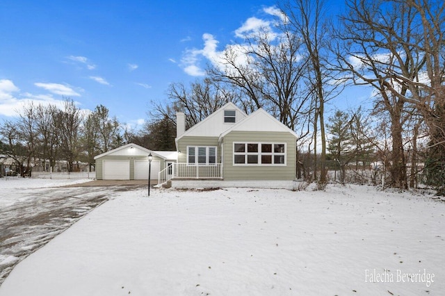 view of front of property with an outbuilding and a garage