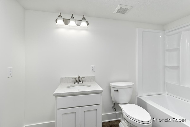 full bathroom with shower / tub combination, vanity, and toilet