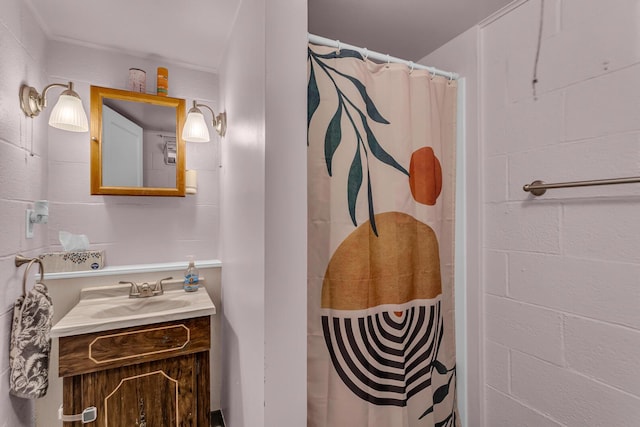 bathroom featuring vanity and curtained shower