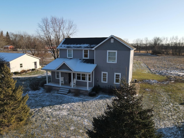 view of property with covered porch